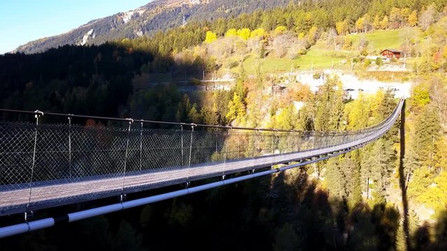 suspended bridge in the mountains - swiss tibetan bridge