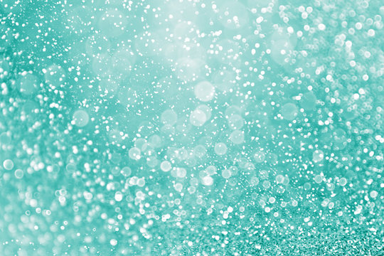 Abstract teal green glitter and aqua mint sparkle background