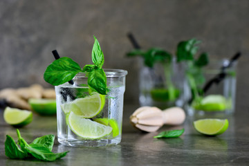 Basil limeade or alcohol cocktail in a glass