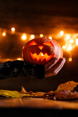 Picture of halloween background with pumpkin and witch hand