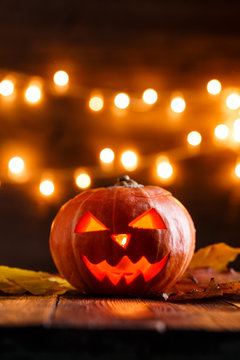 Photo of halloween pumpkin cut in shape of face