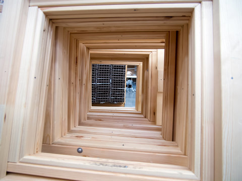 New wooden window frames arranged in a row
