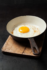 Sunny side up egg in cast iron pan