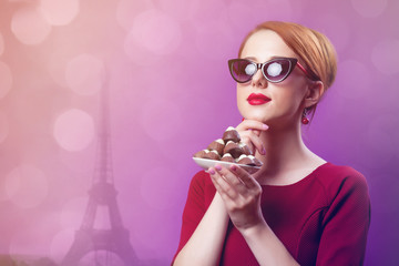 woman with plate full of chocolate candies