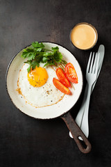 Sunny side up egg in cast iron pan