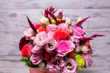 beautiful floral arrangement, pink and red rose, pink eustoma, yellow chrysanthemum