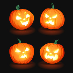 Set of Halloween pumpkins on a black background