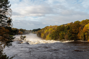 Kristiansand, Norway - October 3, 2017: The waterfall at Boen under the big flooding in the river Tovdalselva in Kristiansand, Norway