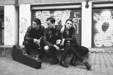Punk rock band portrait in the street