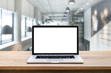 Fototapeta premium Computer,laptop with blank screen on blur modern/contemporary hall backgrounds