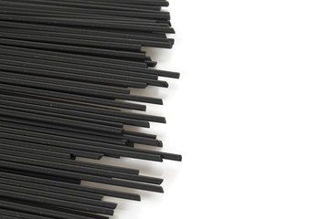 Fototapeta premium black spaghetti isolated on white