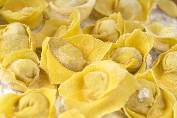 flouring tortellini ready to cook in the broth