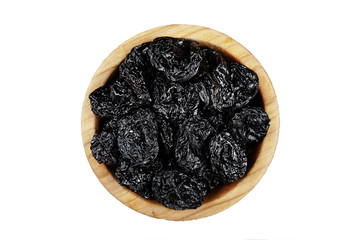 prunes in a plate isolated