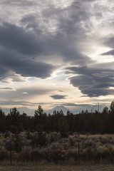 Dramatic Clouds Over Desert Landscape