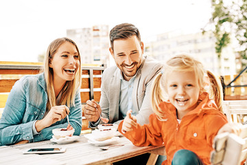Family enjoying restaurant