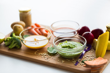 vegetable puree or baby food in glass bowls