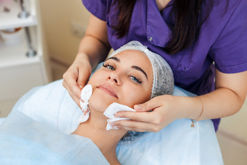 Drying facial wipes. Cosmetic procedures Mechanical cleaning of the face. Cosmetology.