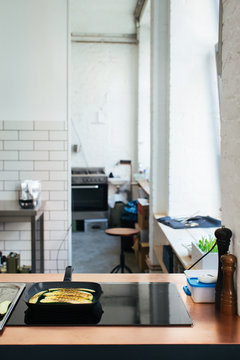 Empty White Kitchen With Induction Stove