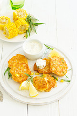 Corn pancakes with cream sauce with tarragon.