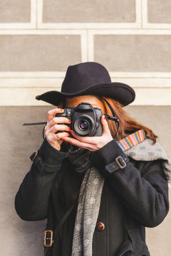 Teenage Girl with Digital Reflex Camera