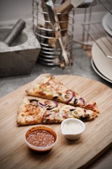 Tasty pizza in the kitchen