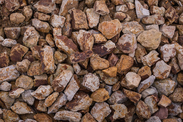 Ground stone grey background of many small stones