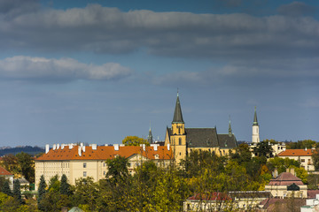 Fototapeta na wymiar Lighten Prague during nice sunny day. Clear blue sky over czech landmarks.