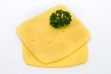 Cheese slices on the white background.