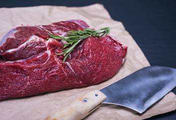 raw beef fillet on a brown sheet of paper