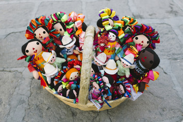 Basket full of mexican dolls