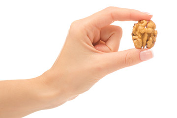 Female hand with walnut