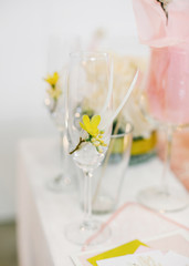 Wedding table setting.Two wedding tall wineglass.