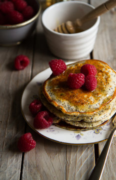 Lemon and poppy seed pancakes with fresh raspberries