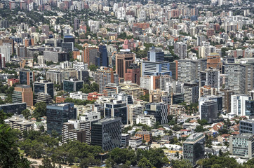 Fototapeta na wymiar Modern apartment buildings and flats in downtown Santiago, Chile.