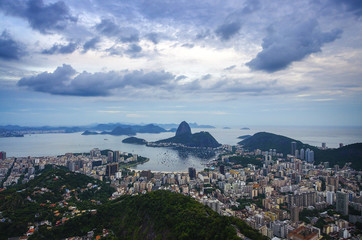Fototapeta na wymiar Sunset view of mountain Sugar Loaf and Botafogo in Rio de Janeiro. Brazil