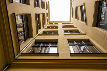 low angle view of yellow apartment house