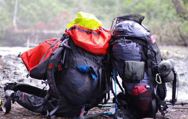 Two backpacks resting against one another