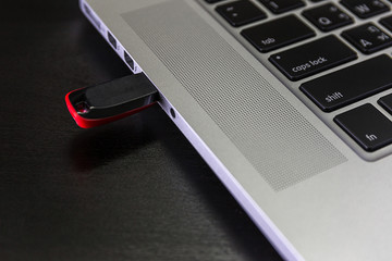 USB flash cards and thumb drive or stick Virtual memory storage with USB cable into slot  laptop...
