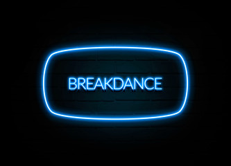 Breakdance  - colorful Neon Sign on brickwall