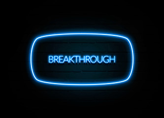 Breakthrough  - colorful Neon Sign on brickwall
