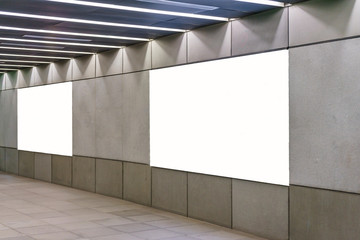 Blank billboard and horizontal big poster in metro subway station. Useful for your advertising.