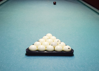 Billiards, billiard table, balls in the triangle. Construction o