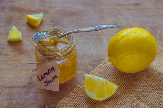Homemade lemon jam in glass jar. Organic fresh yellow jam