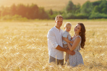 Parents happiness, walking on the field with child