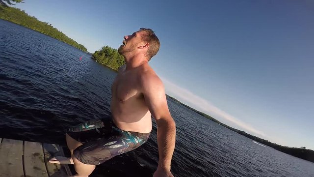 backflip selfie dude off floating tower slow motion