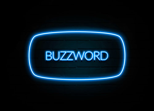 Buzzword  - colorful Neon Sign on brickwall