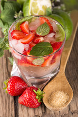 Strawberry mojito cocktail on wooden
