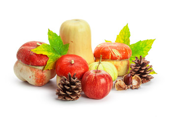 Autumn display with pumpkin and leaves isolated on white background