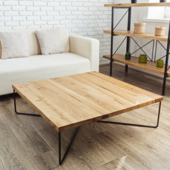 modern wooden table in the loft interior
