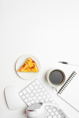 Office desk table with computer, supplies, coffee cup